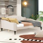Full-size upholstered sofa daybed – beige tufted cushions