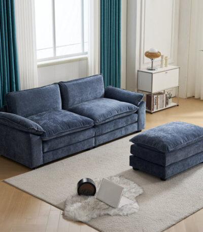 Close-up of double cushions on chenille sofa